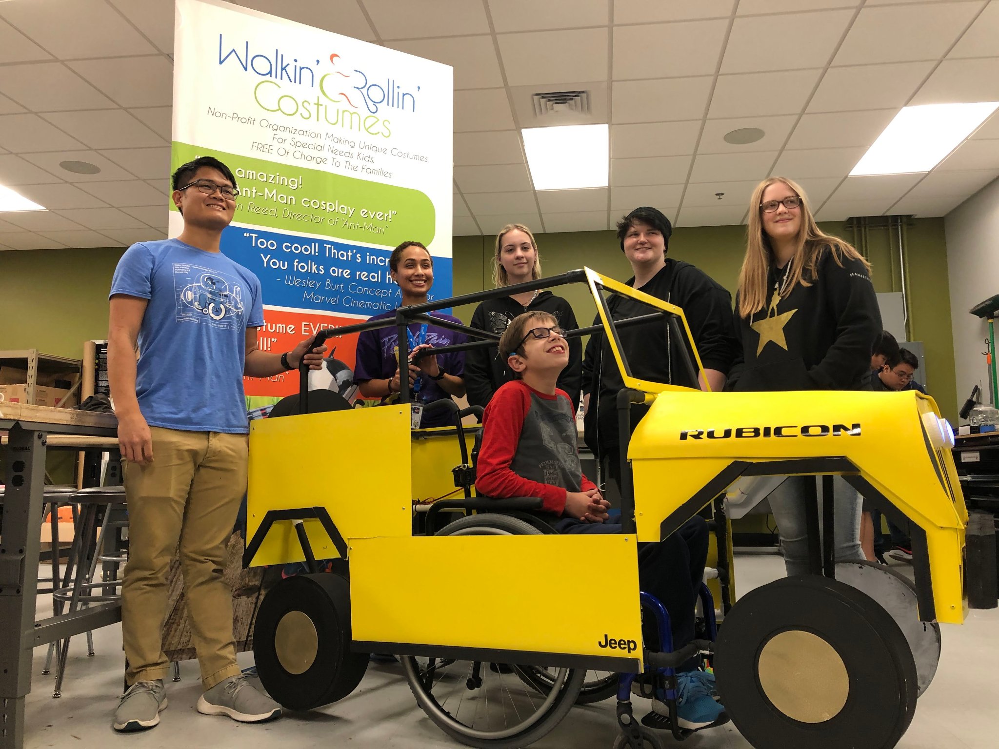 Yellow Jeep wheelchair costume and team from WSU